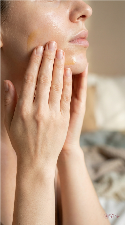 Gentle skincare routine with hands pressing product into skin, supporting acne-prone sensitive skin and long-term skin longevity.